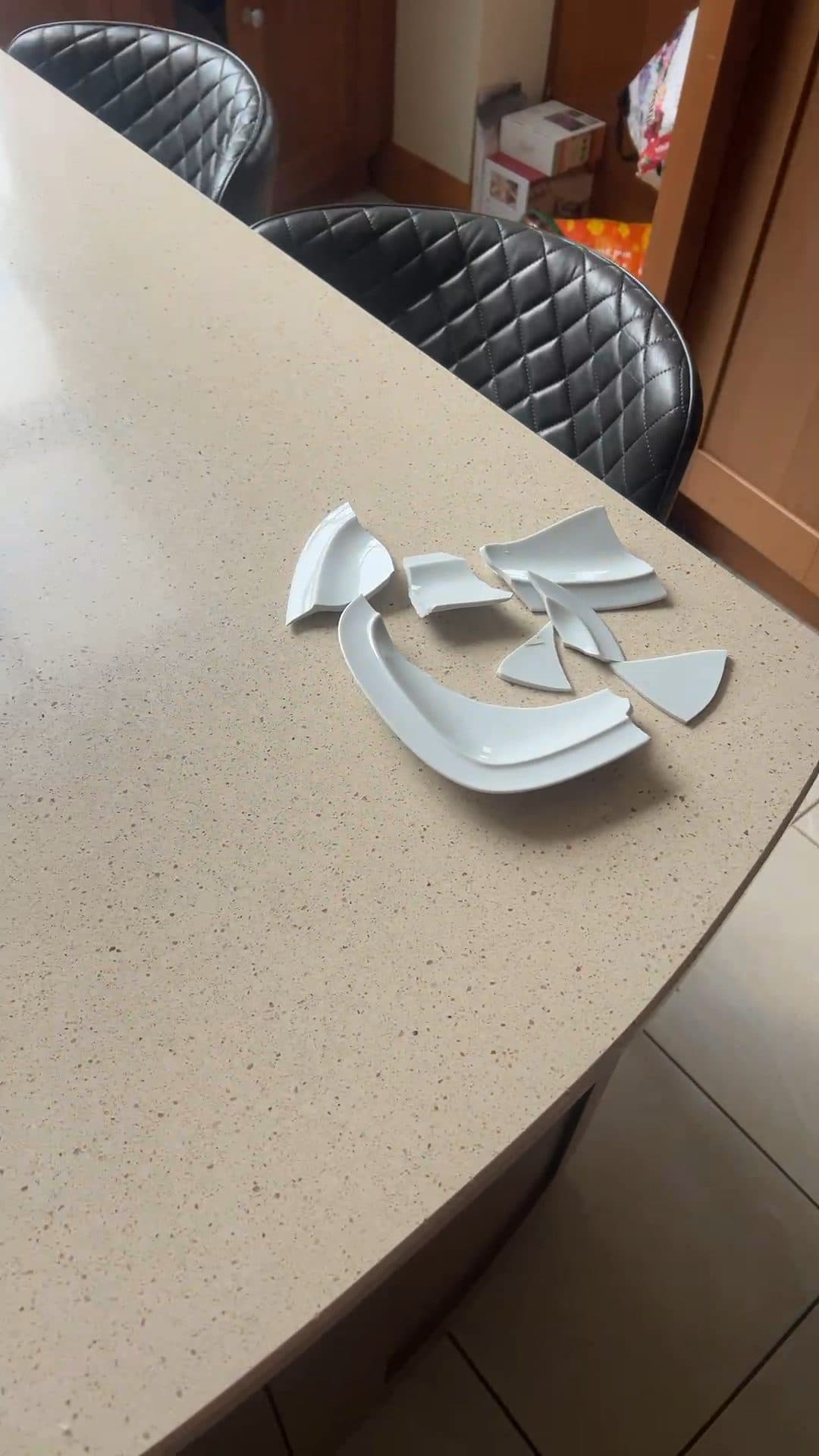 The same kitchen island with a broken plate, from the current walkthrough